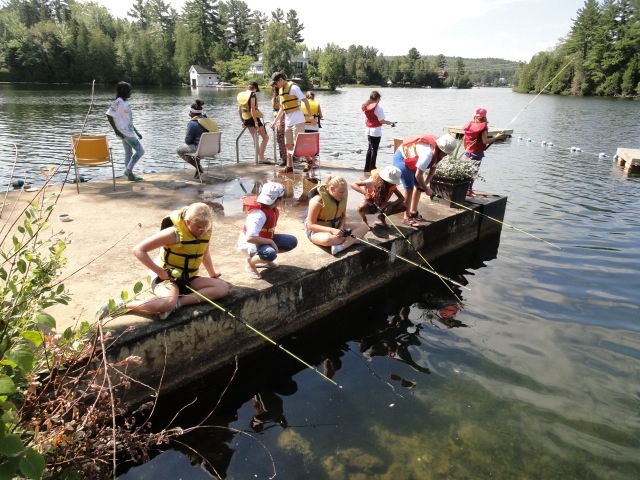 Fishing from the dock at Camp Liberté, 2013
